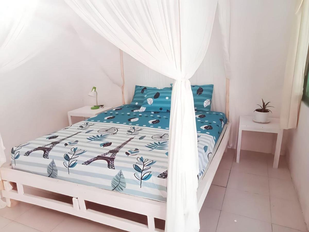 The Village Rua Beach Homestay Kültér fotó